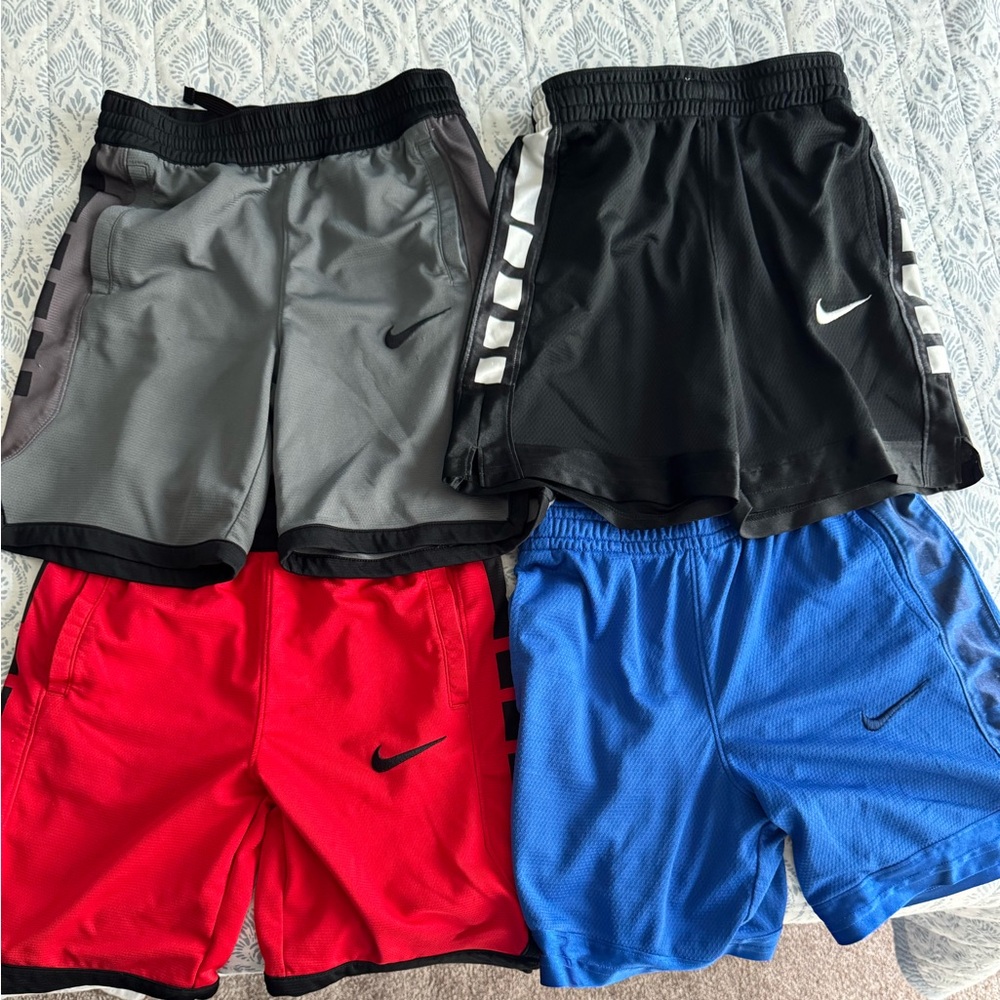 Nike Sports Shorts Collection - Red, Blue, Gray, Black.  Youth Medium (4 pairs)